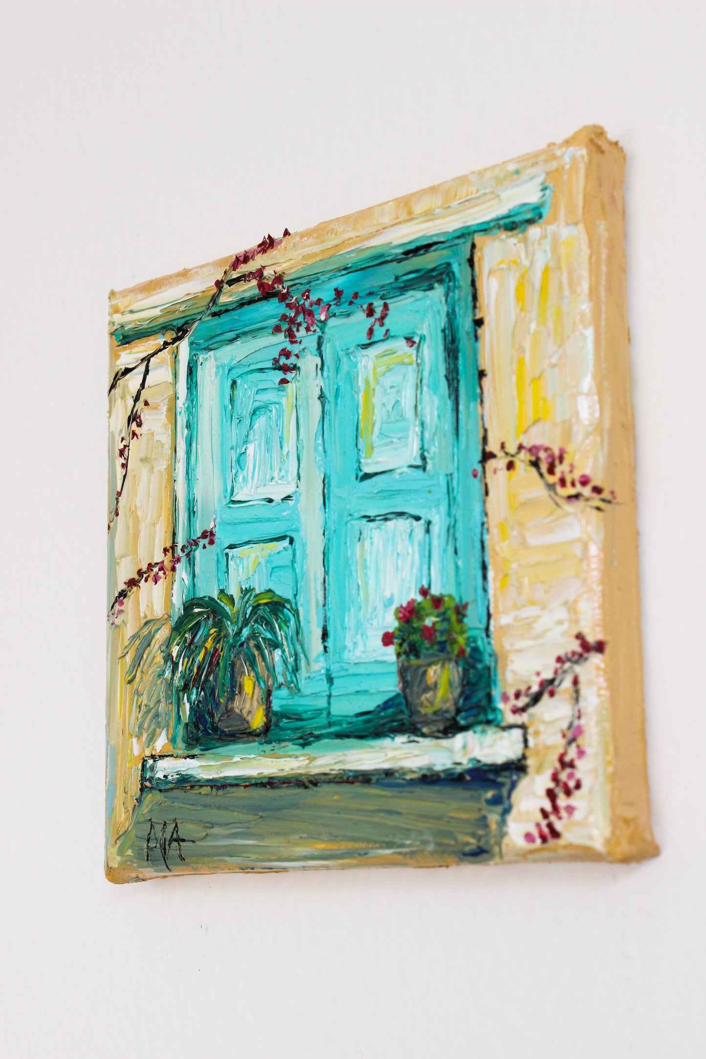 Blue window with flower pots